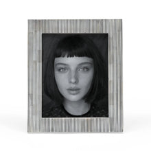 Load image into Gallery viewer, Framed portrait of a person with a striped frame